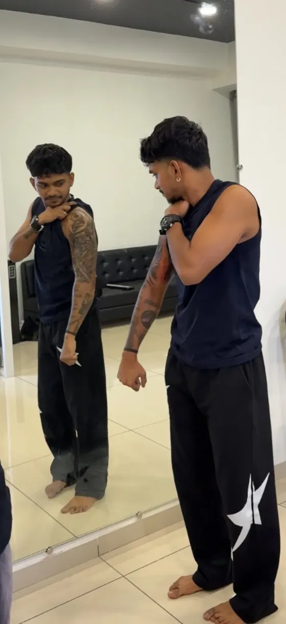 Client showing a full-arm sleeve tattoo done at The Kala Culture Tattoos, Vadodara